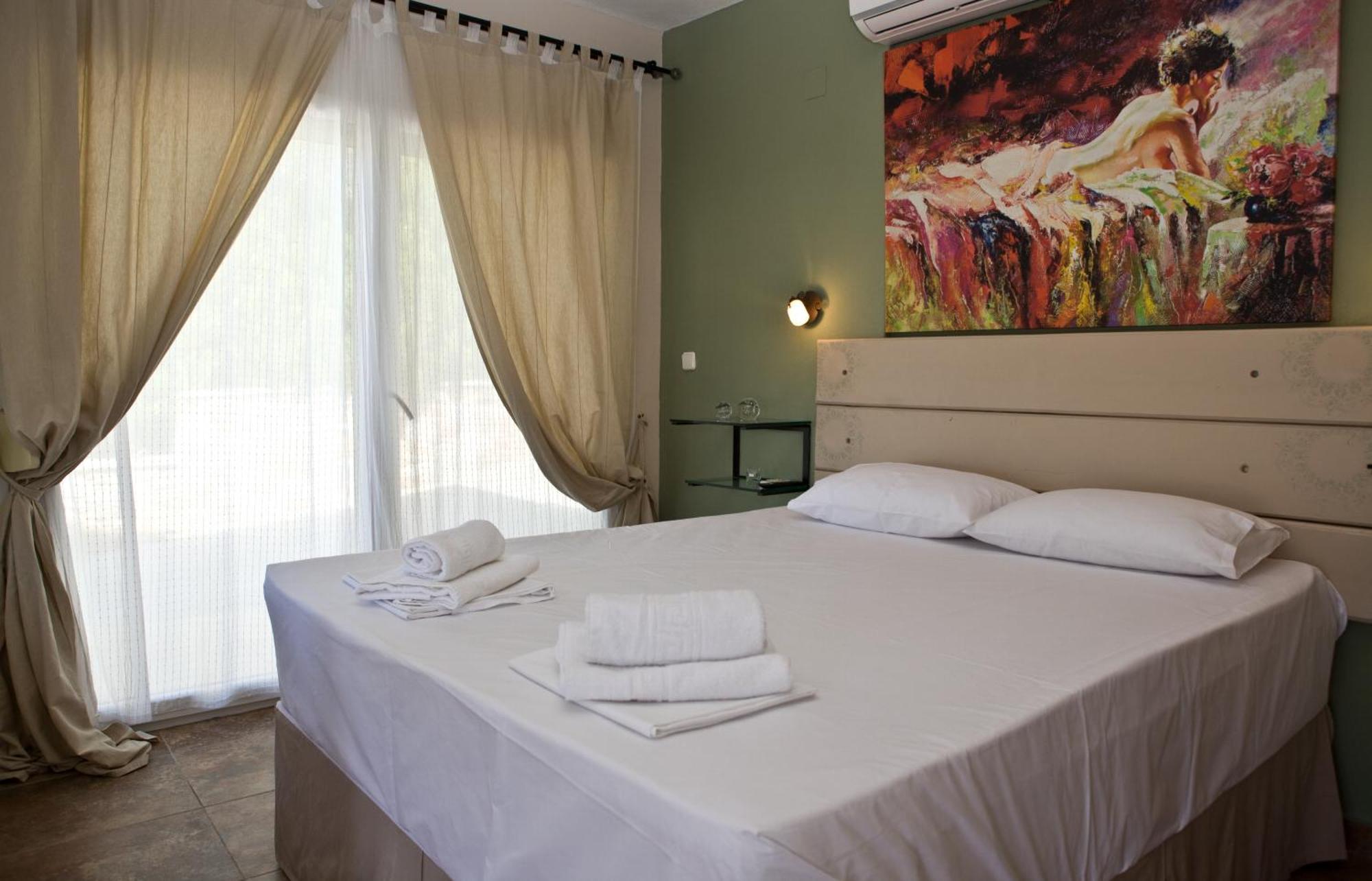 Axion Esti Apartments Skopelos Pokoj fotografie